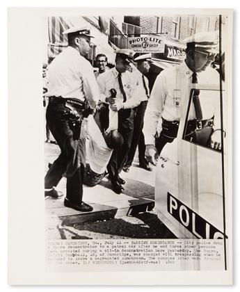 (CIVIL RIGHTS.) PHOTOGRAPHY. Group of 16 press wire service photographs from the decades of the civil rights struggle, the shooting of